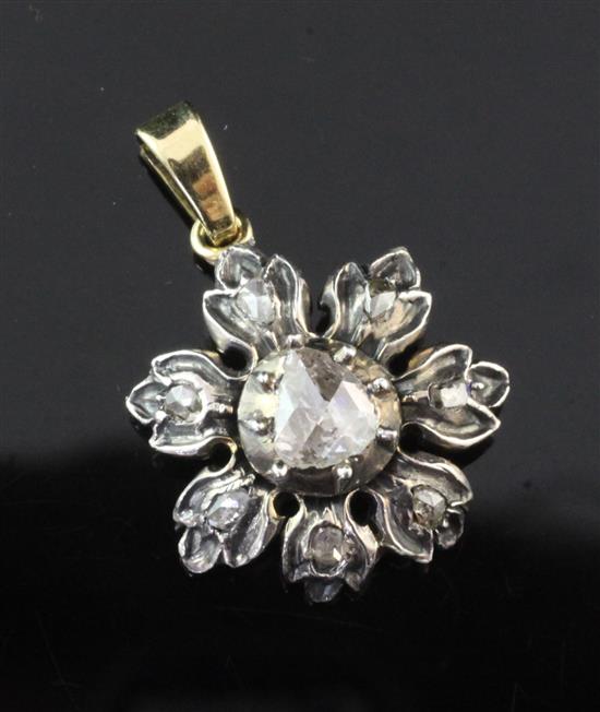 A 19th century gold, silver and diamond set flower head pendant, 0.75in.